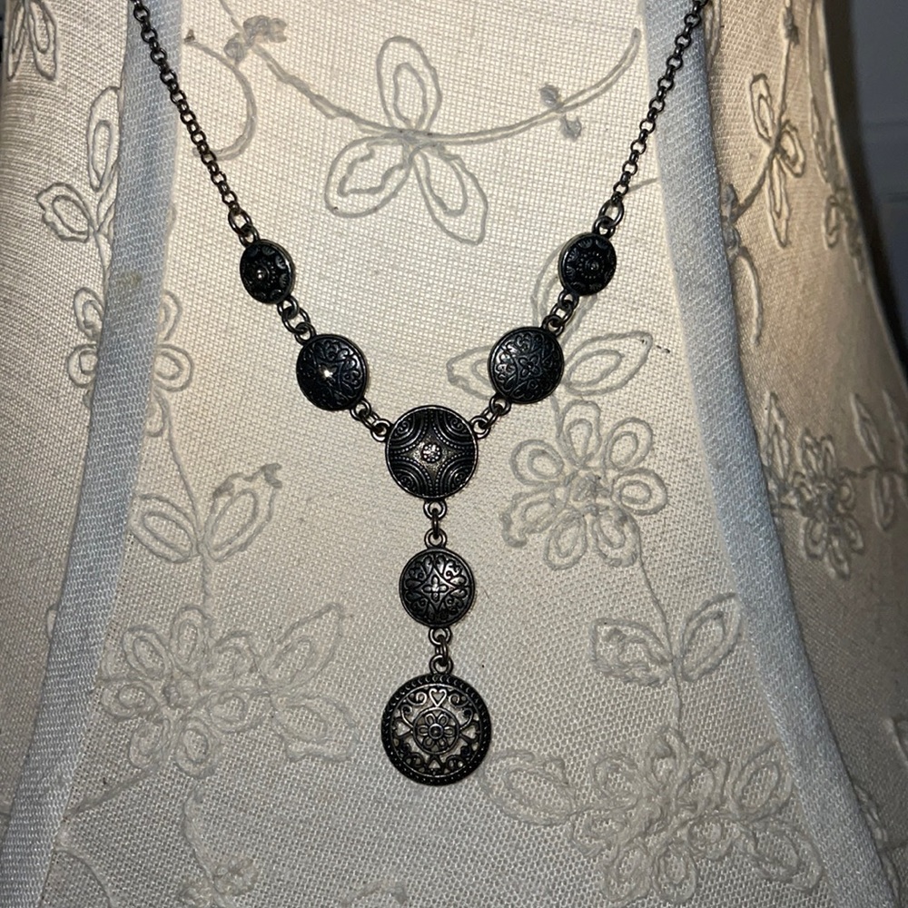 Silver antique looking necklace.